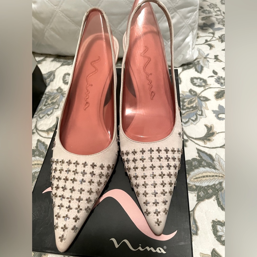 New in box! Size 7.5 Nina sling back shoes with small heel.